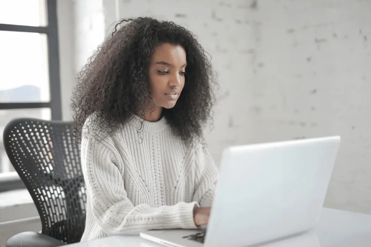 Student studying online with laptop — representing online class help services FAQs